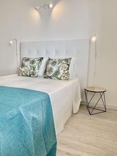 Quarto com roupa de cama fresca